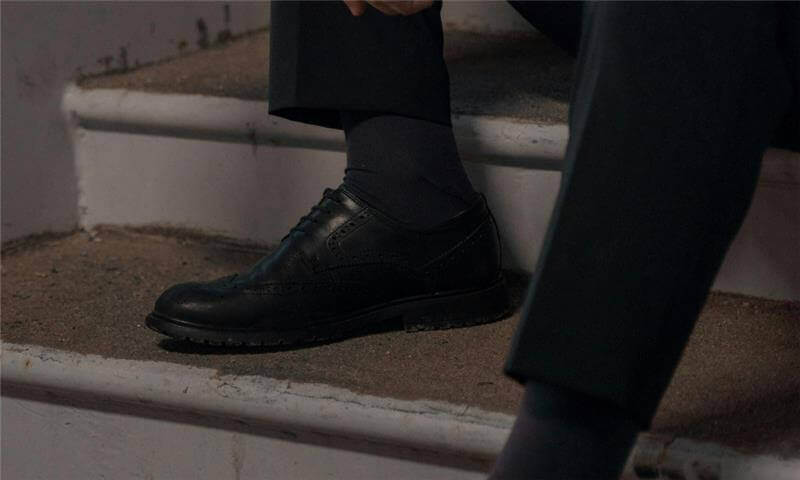 Black dress shoe paired with Lafitte premium business socks 