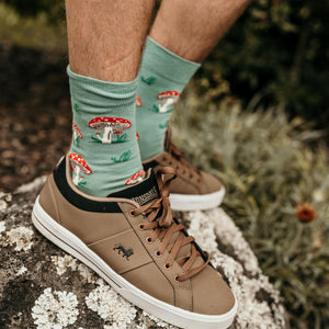 Person wearing Mushroom Crew Socks in mint, red, and white cotton