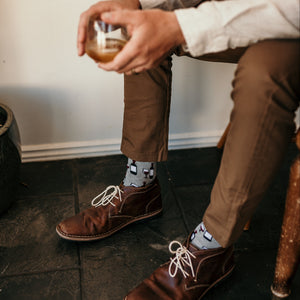 Person wearing Wine Lover Crew Socks in marle grey cotton